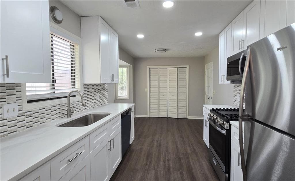 4 bedroom, 2 bathroom, 1,858 sq ft single family residence for sale at 2667 Camelot Court, Duluth, GA 30096 — photo 7