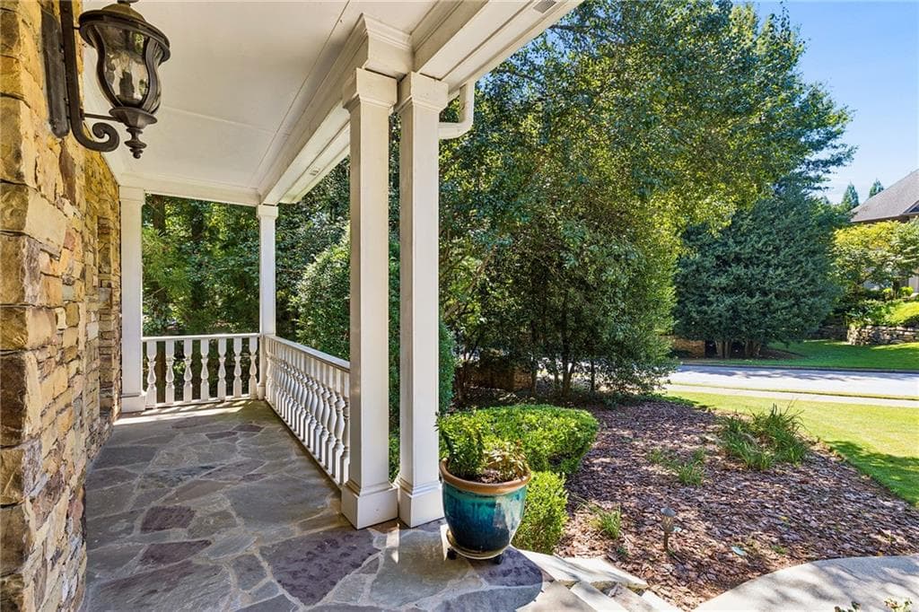 5 bedroom, 5 bathroom, 6,112 sq ft single family residence for sale at 9835 Autry Falls Drive, Johns Creek, GA 30022 — photo 2