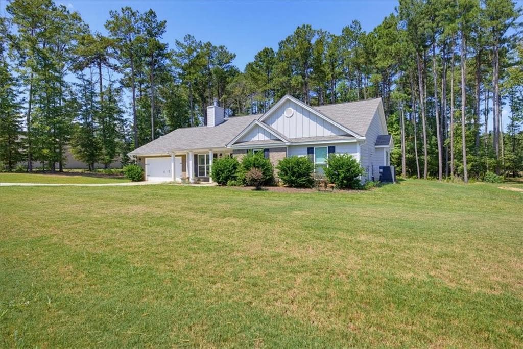 4 bedroom, 3 bathroom, 2,165 sq ft single family residence for sale at 62 Windrow Trail, Statham, GA 30666 — photo 2