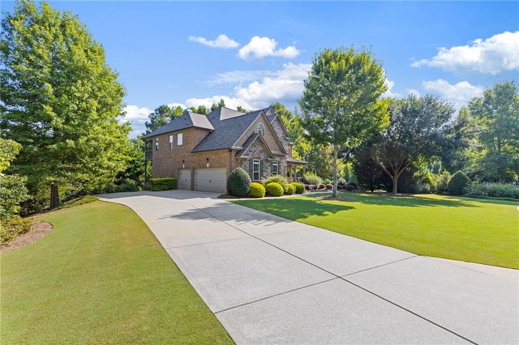 6 bedroom, 5 bathroom, 5,283 sq ft single family residence for sale at 1856 Heritage Pass, Milton, GA 30004 — photo 4