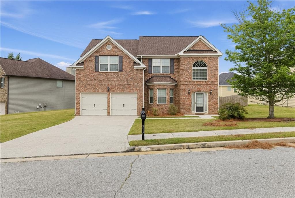 5 bedroom, 3 bathroom, 2,509 sq ft single family residence for sale at 217 Saintvry Path, Atlanta, GA 30349 — photo 2
