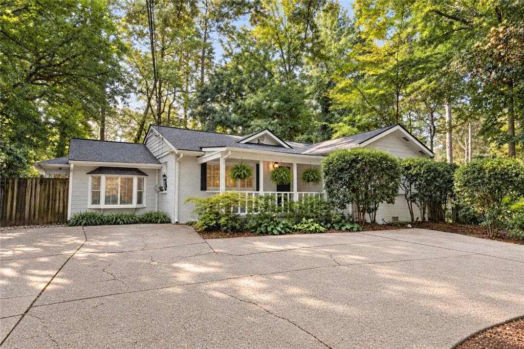 4 bedroom, 3 bathroom, 2,373 sq ft single family residence for sale at 1792 Moores Mill Road, Atlanta, GA 30318 — photo 1 of 31