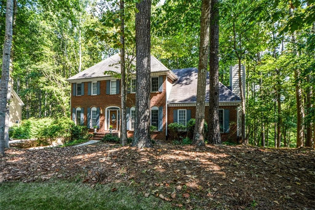 4 bedroom, 3 bathroom, 3,380 sq ft single family residence for sale at 3515 Stone Cliff Way, Woodstock, GA 30189 — photo 2