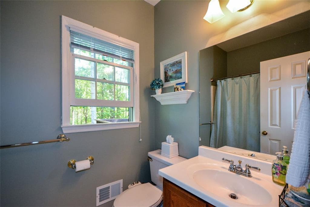 4 bedroom, 3 bathroom, 3,380 sq ft single family residence for sale at 3515 Stone Cliff Way, Woodstock, GA 30189 — photo 8