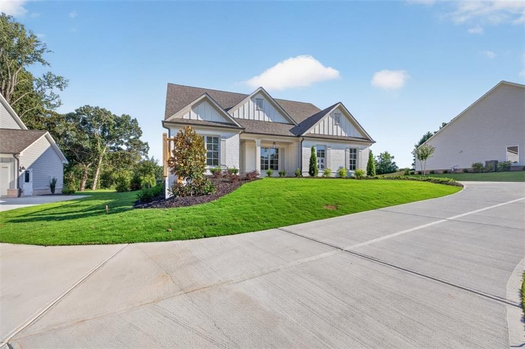 4 bedroom, 3 bathroom, 2,542 sq ft single family residence for sale at 4775 E Reed Road, Gainesville, GA 30507 — photo 2