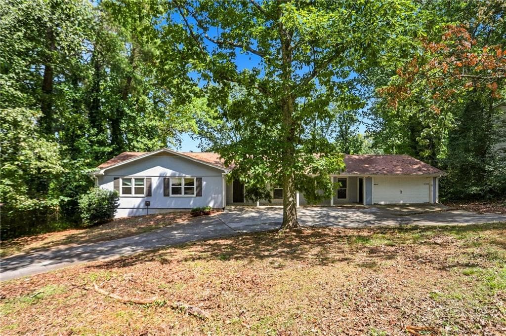 4 bedroom, 2 bathroom, 3,024 sq ft single family residence for sale at 2324 Sussex Court, Snellville, GA 30078 — photo 1 of 50