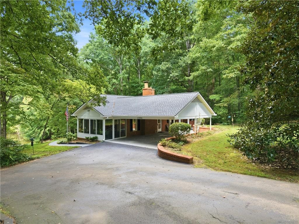 4 bedroom, 3 bathroom, 4,080 sq ft single family residence for sale at 2306 E Cherokee Drive, Woodstock, GA 30188 — photo 8