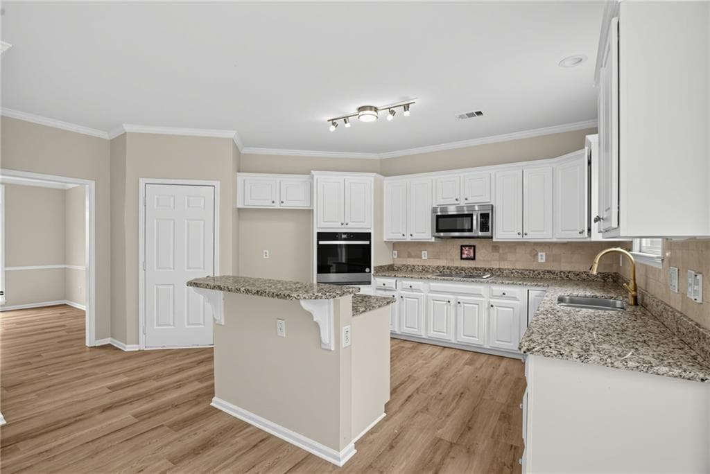 5 bedroom, 3 bathroom, 2,789 sq ft single family residence for sale at 110 Hidden Lake, Fayetteville, GA 30215 — photo 7