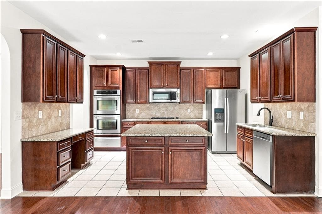 5 bedroom, 4 bathroom, 4,026 sq ft single family residence for sale at 4805 Carriage Bridge Lane, Cumming, GA 30040 — photo 3