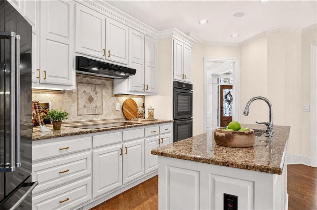 5 bedroom, 5 bathroom, 5,151 sq ft single family residence for sale at 1213 Edenham Lane, Cumming, GA 30041 — photo 10