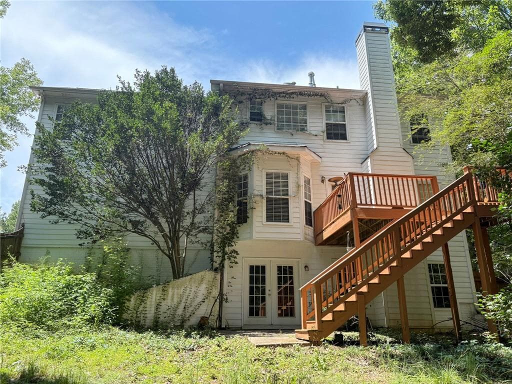 4 bedroom, 3 bathroom, 1,308 sq ft single family residence for sale at 130 Cutstone Court, Fayetteville, GA 30215 — photo 2
