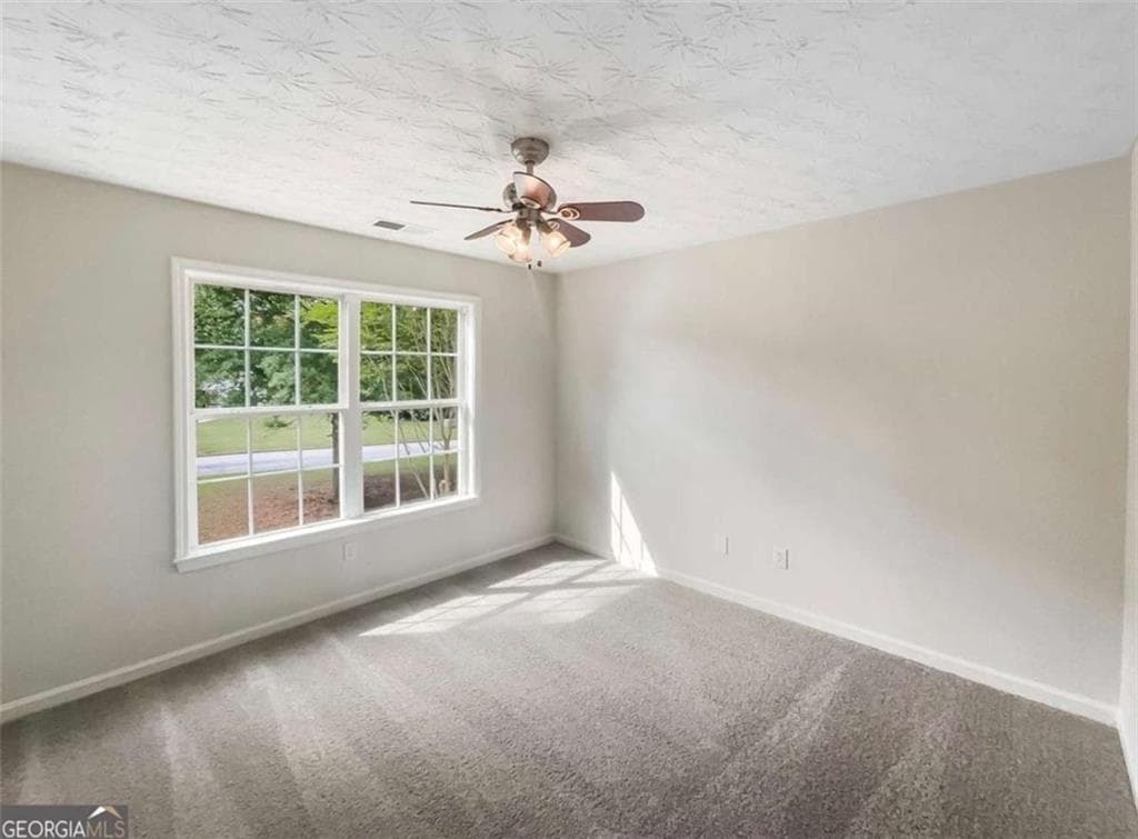 5 bedroom, 3 bathroom, 2,094 sq ft single family residence for sale at 834 Winding Grove Lane, Loganville, GA 30052 — photo 8