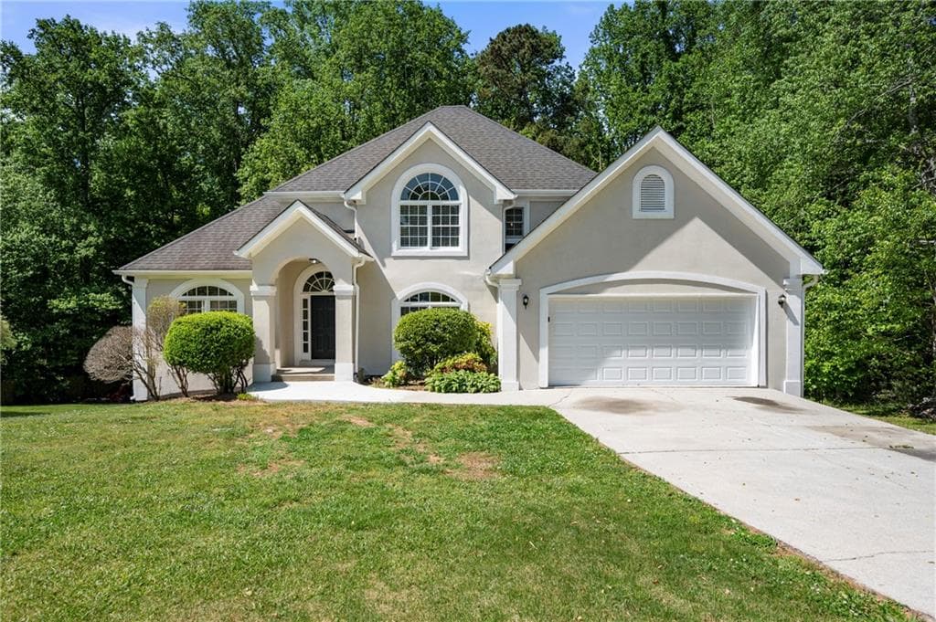4 bedroom, 3 bathroom, 2,416 sq ft single family residence for sale at 5723 Garden Walk, Flowery Branch, GA 30542 — photo 1 of 16