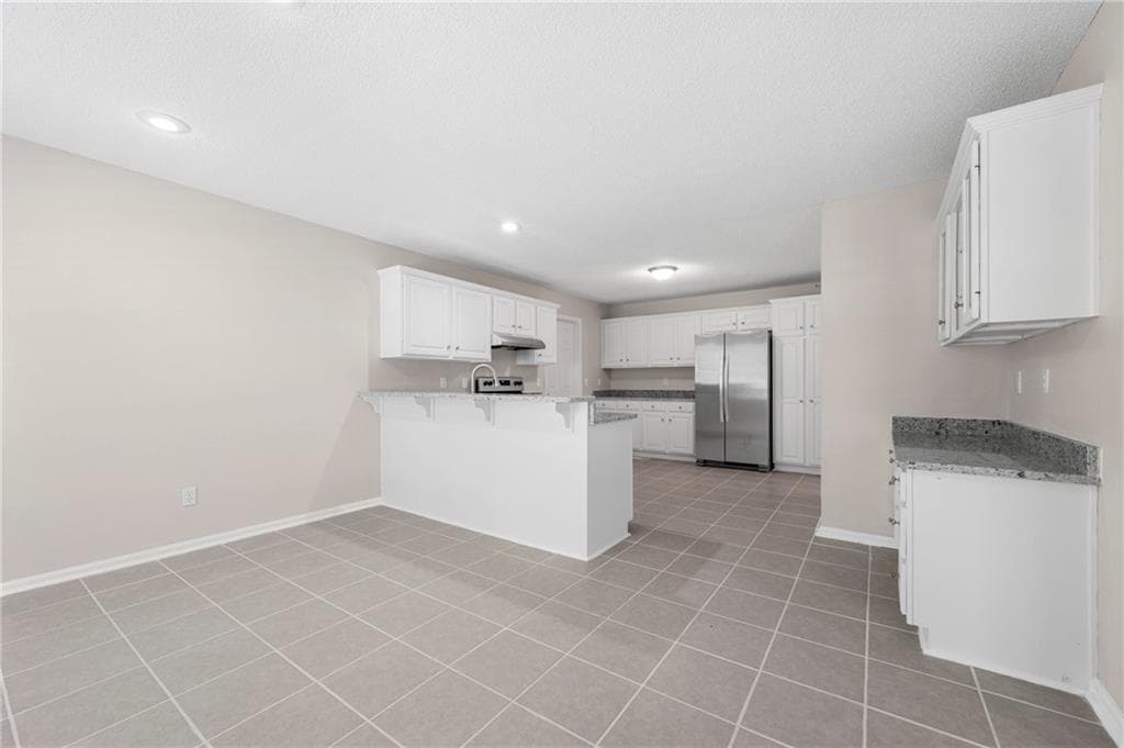 4 bedroom, 3 bathroom, 2,416 sq ft single family residence for sale at 5723 Garden Walk, Flowery Branch, GA 30542 — photo 6