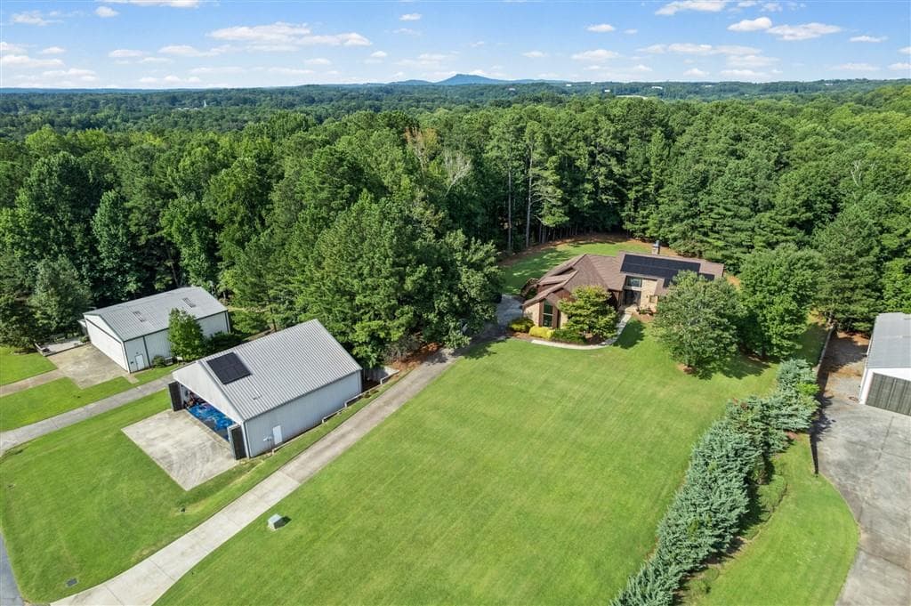 7 bedroom, 5 bathroom, 3,373 sq ft single family residence for sale at 2320 Kitfox Circle, Cumming, GA 30041 — photo 2