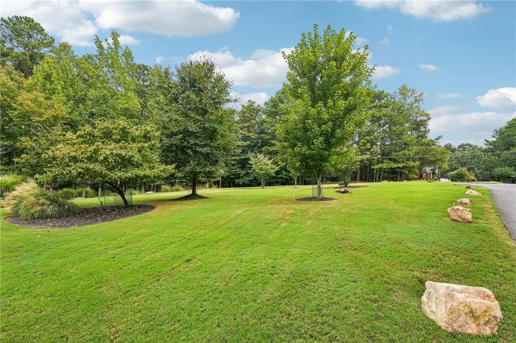 3 bedroom, 3 bathroom, 3,520 sq ft single family residence for sale at 1100 Waterfall Way, Canton, GA 30114 — photo 7