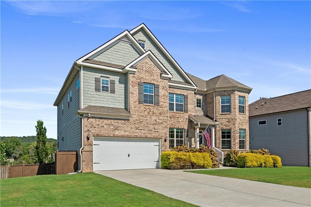 6 bedroom, 5 bathroom, 6,234 sq ft single family residence for sale at 7715 Tiberon Parkway, Cumming, GA 30028 — photo 4