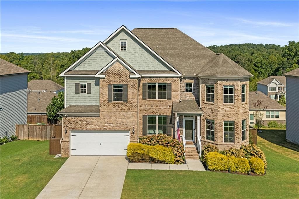 6 bedroom, 5 bathroom, 6,234 sq ft single family residence for sale at 7715 Tiberon Parkway, Cumming, GA 30028 — photo 5