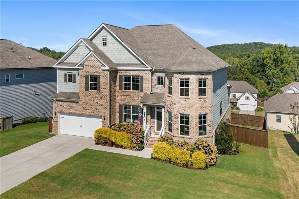 6 bedroom, 5 bathroom, 6,234 sq ft single family residence for sale at 7715 Tiberon Parkway, Cumming, GA 30028 — photo 6