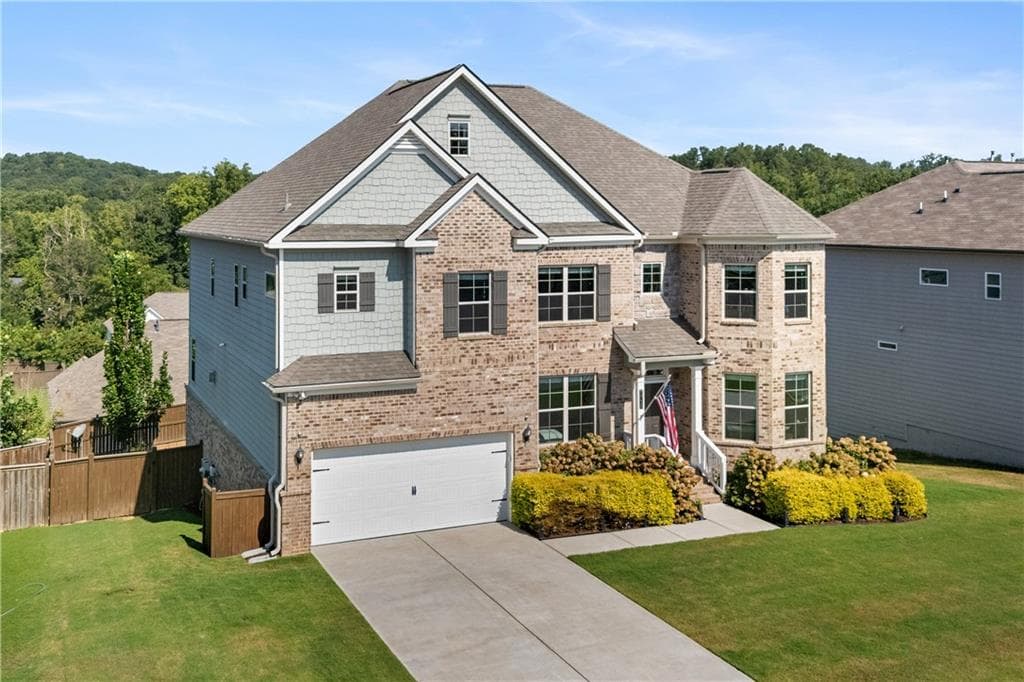 6 bedroom, 5 bathroom, 6,234 sq ft single family residence for sale at 7715 Tiberon Parkway, Cumming, GA 30028 — photo 7