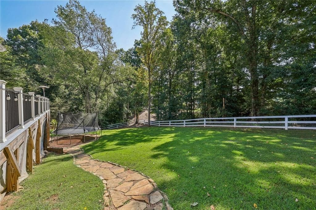 5 bedroom, 4 bathroom, 4,107 sq ft single family residence for sale at 2835 Live Oak Court, Cumming, GA 30041 — photo 3