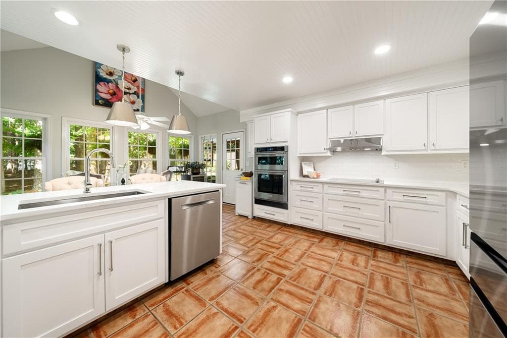 4 bedroom, 3 bathroom, 3,678 sq ft single family residence for sale at 3691 Howell Wood Trail, Duluth, GA 30096 — photo 7