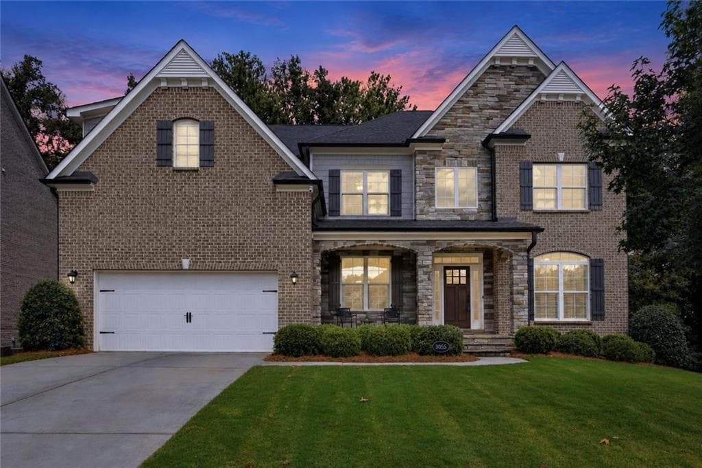 6 bedroom, 5 bathroom, 5,272 sq ft single family residence for sale at 3055 Annapolis Way, Cumming, GA 30041 — photo 2