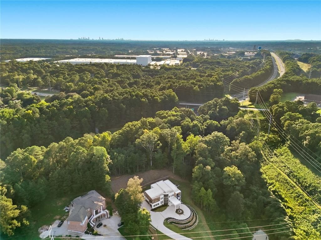 5 bedroom, 6 bathroom, 8,166 sq ft single family residence for sale at 1612 Mountain Shadow Trail, Stone Mountain, GA 30087 — photo 6