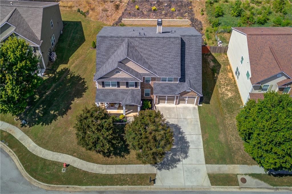 5 bedroom, 4 bathroom, 3,330 sq ft single family residence for sale at 1806 Madrid Falls Road, Braselton, GA 30517 — photo 2