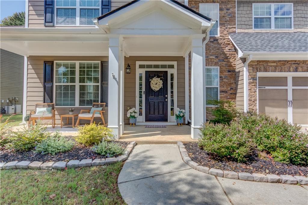 5 bedroom, 4 bathroom, 3,330 sq ft single family residence for sale at 1806 Madrid Falls Road, Braselton, GA 30517 — photo 4