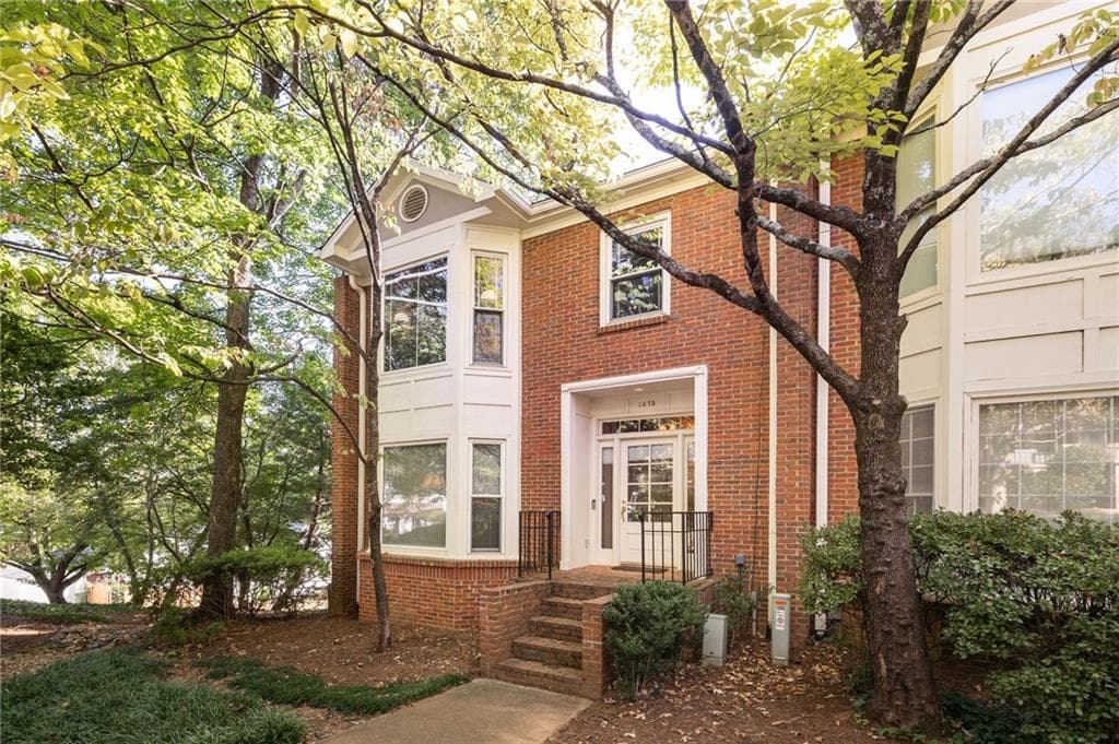 2 bedroom, 3 bathroom, 1,818 sq ft townhouse for sale at 1075 High Point Drive, Atlanta, GA 30306 — photo 1 of 23