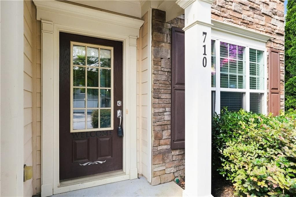 4 bedroom, 3 bathroom, 2,023 sq ft single family residence for sale at 710 Berkeley Terrace, Canton, GA 30115 — photo 4
