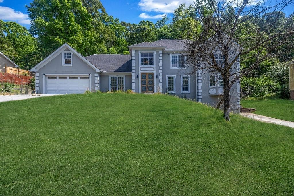 5 bedroom, 4 bathroom, 3,785 sq ft single family residence for sale at 4634 Riveredge Cove, Snellville, GA 30039 — photo 2