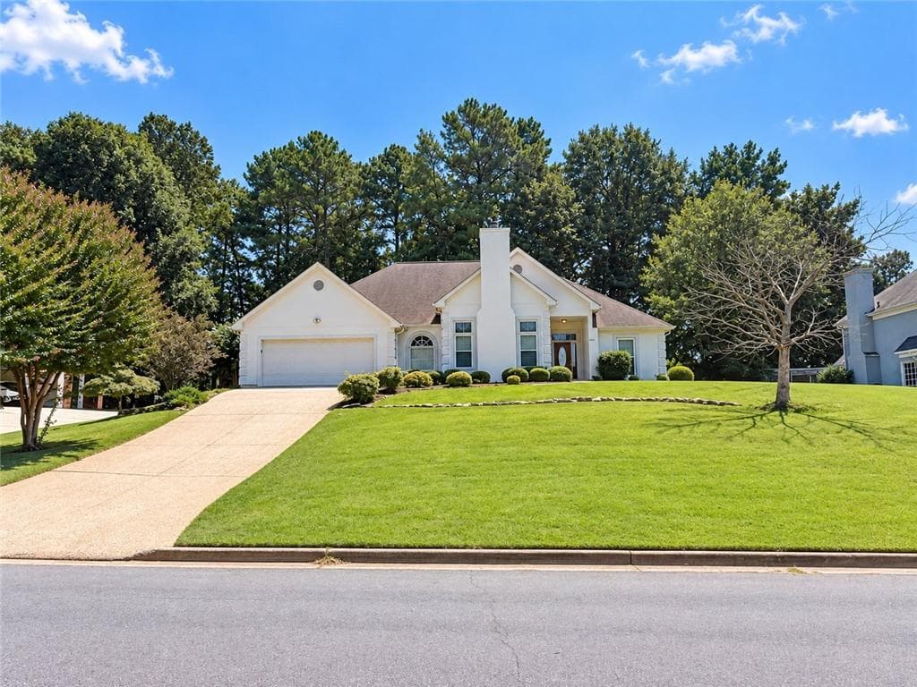 3 bedroom, 2 bathroom, 2,685 sq ft single family residence for sale at 1090 Swan Mill Court, Suwanee, GA 30024 — photo 1 of 55