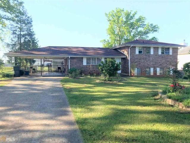 5 bedroom, 2 bathroom, 2,075 sq ft single family residence for sale at 6853 New Dale Road, Rex, GA 30273