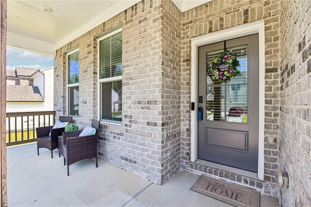 5 bedroom, 4 bathroom, 3,321 sq ft single family residence for sale at 2456 Hidden Creek Road, Kennesaw, GA 30152 — photo 2