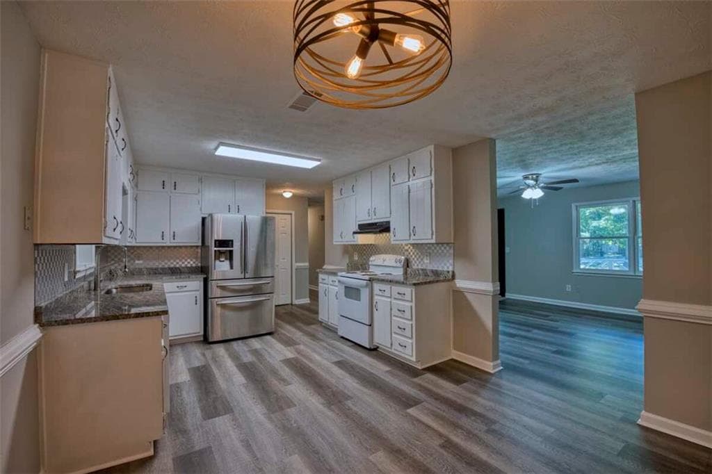 5 bedroom, 2 bathroom single family residence for sale at 402 Trotters Ridge, Lawrenceville, GA 30043 — photo 7