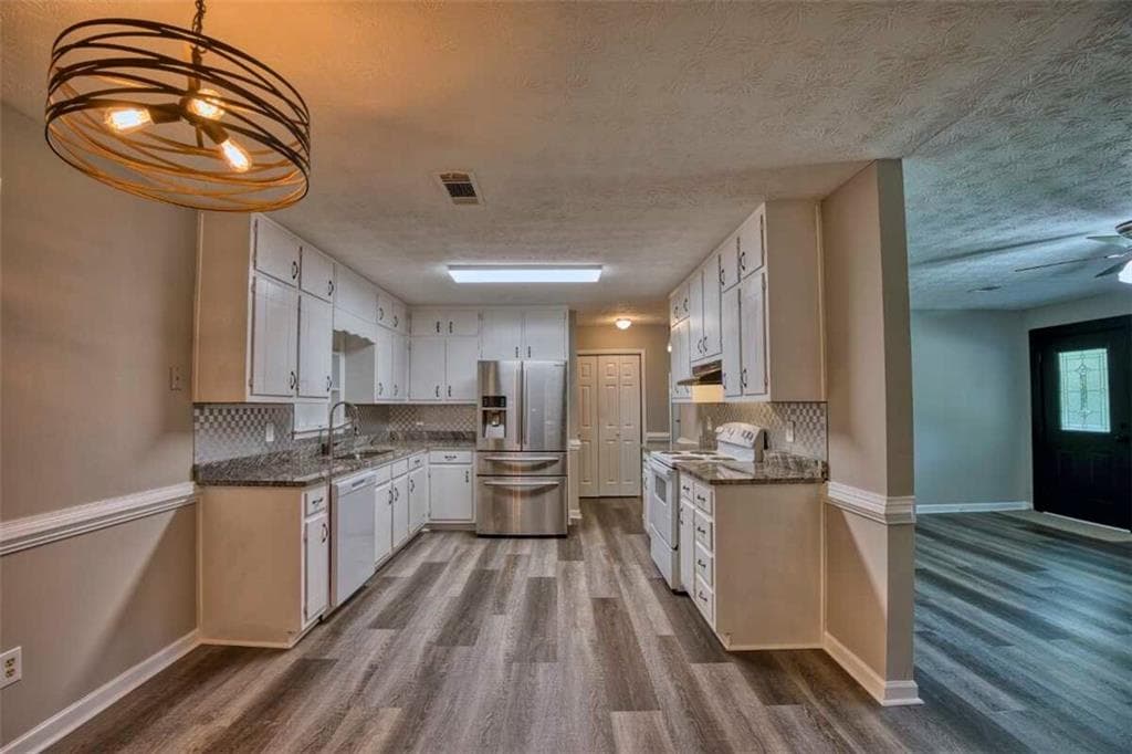 5 bedroom, 2 bathroom single family residence for sale at 402 Trotters Ridge, Lawrenceville, GA 30043 — photo 8