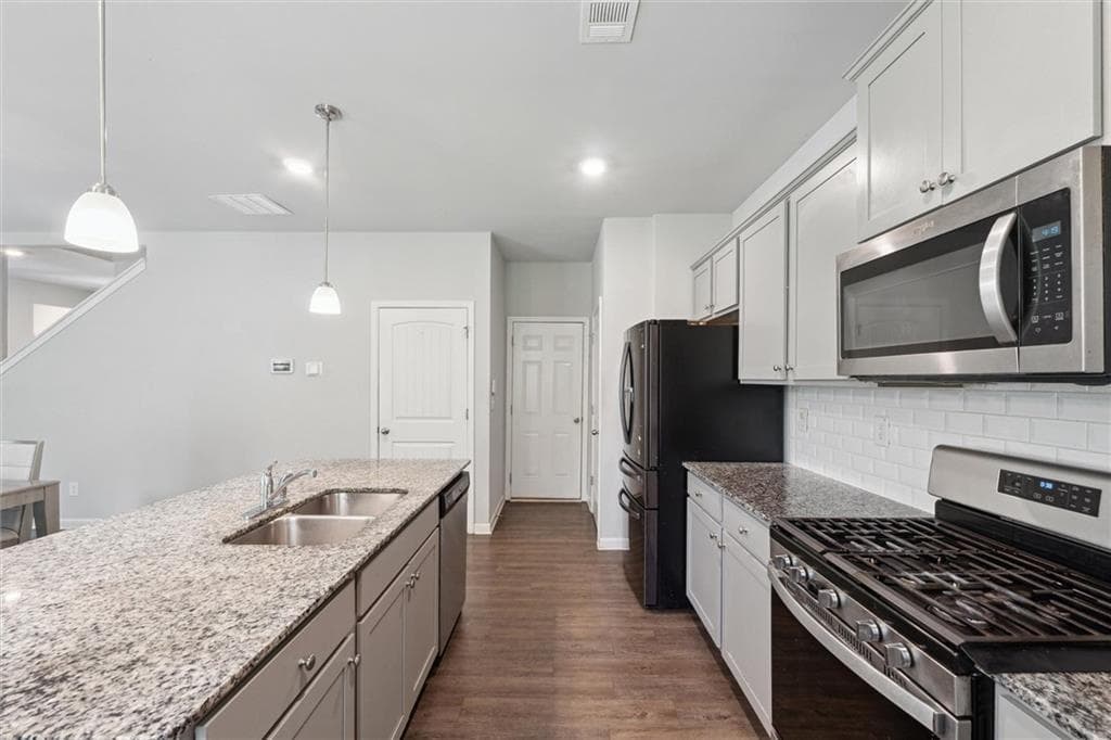 4 bedroom, 3 bathroom, 2,452 sq ft single family residence for sale at 3604 Wartrace Drive, Atlanta, GA 30331 — photo 3