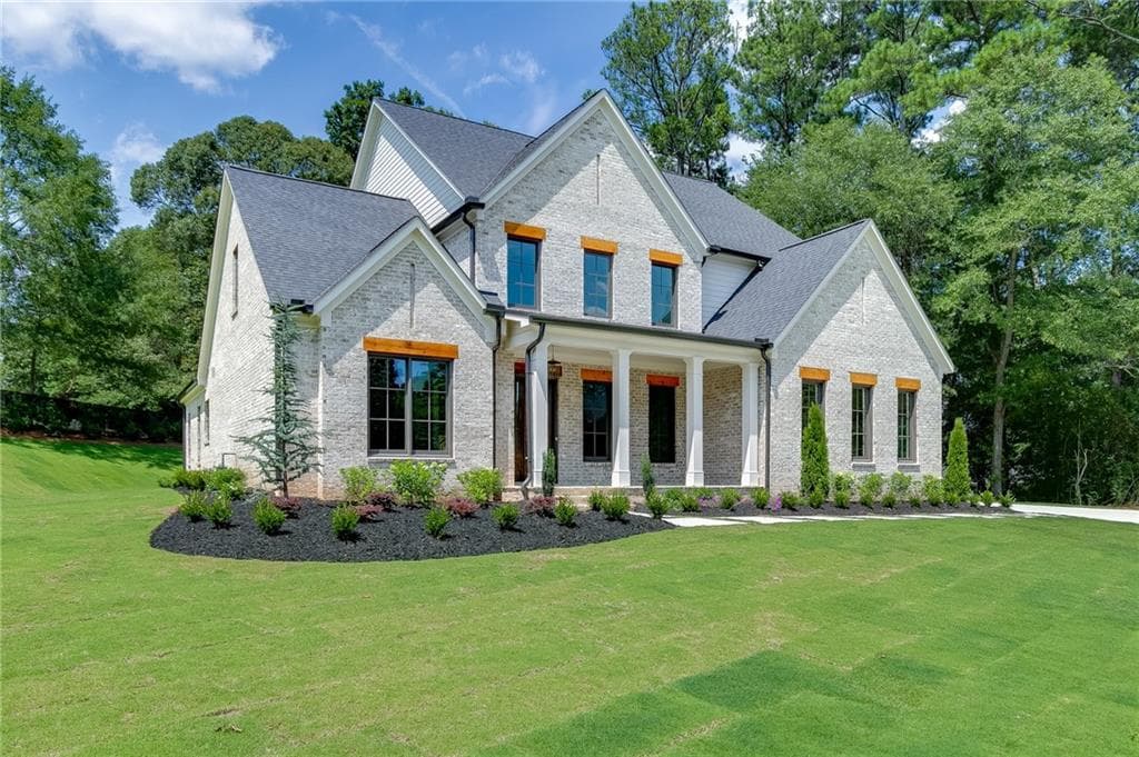 4 bedroom, 5 bathroom, 4,417 sq ft single family residence for sale at 2971 N Bogan Road, Buford, GA 30519 — photo 2