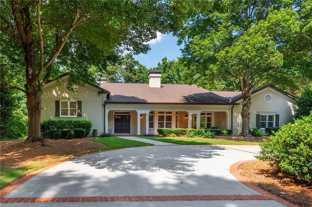 6 bedroom, 7 bathroom, 7,043 sq ft single family residence for sale at 1025 Stonegate Court, Roswell, GA 30075