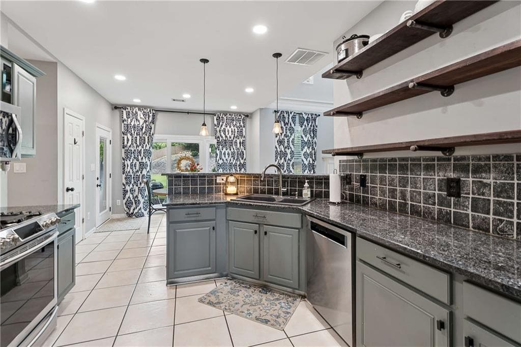 4 bedroom, 3 bathroom, 2,128 sq ft single family residence for sale at 4564 Bogan Gates Trail, Buford, GA 30519 — photo 4