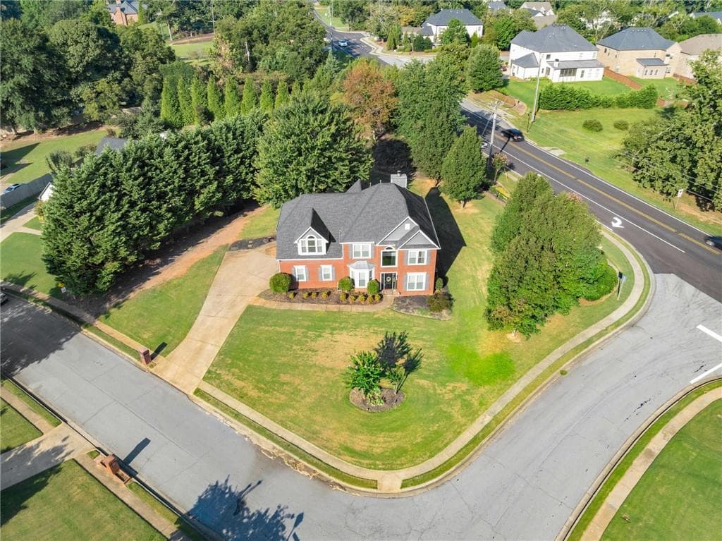 4 bedroom, 3 bathroom, 2,128 sq ft single family residence for sale at 4564 Bogan Gates Trail, Buford, GA 30519 — photo 2