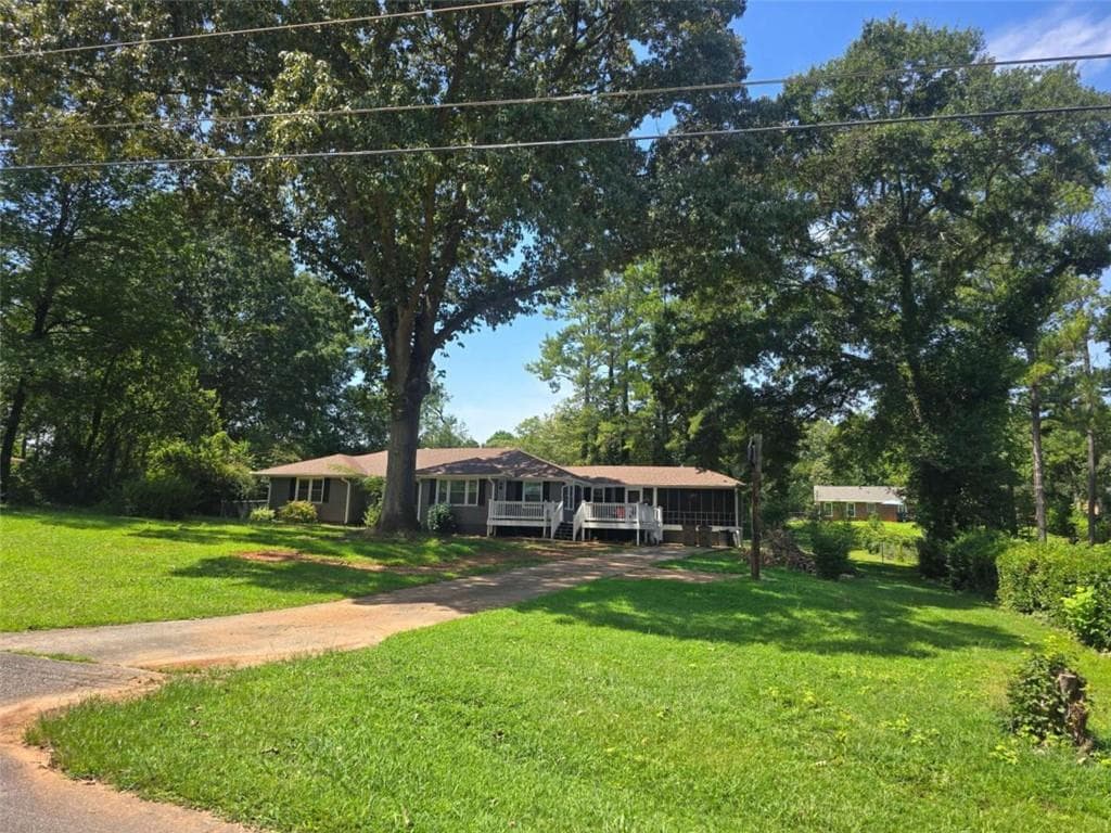 4 bedroom, 3 bathroom, 1,919 sq ft single family residence for sale at 7379 Dexter Drive, Riverdale, GA 30296 — photo 4
