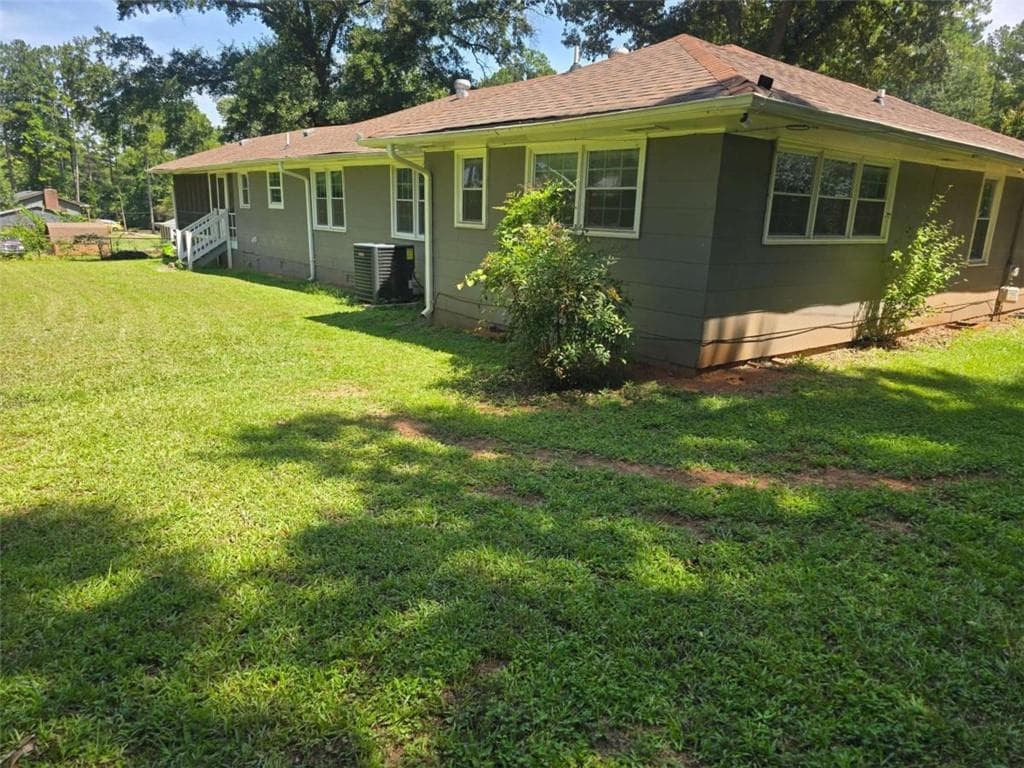 4 bedroom, 3 bathroom, 1,919 sq ft single family residence for sale at 7379 Dexter Drive, Riverdale, GA 30296 — photo 6