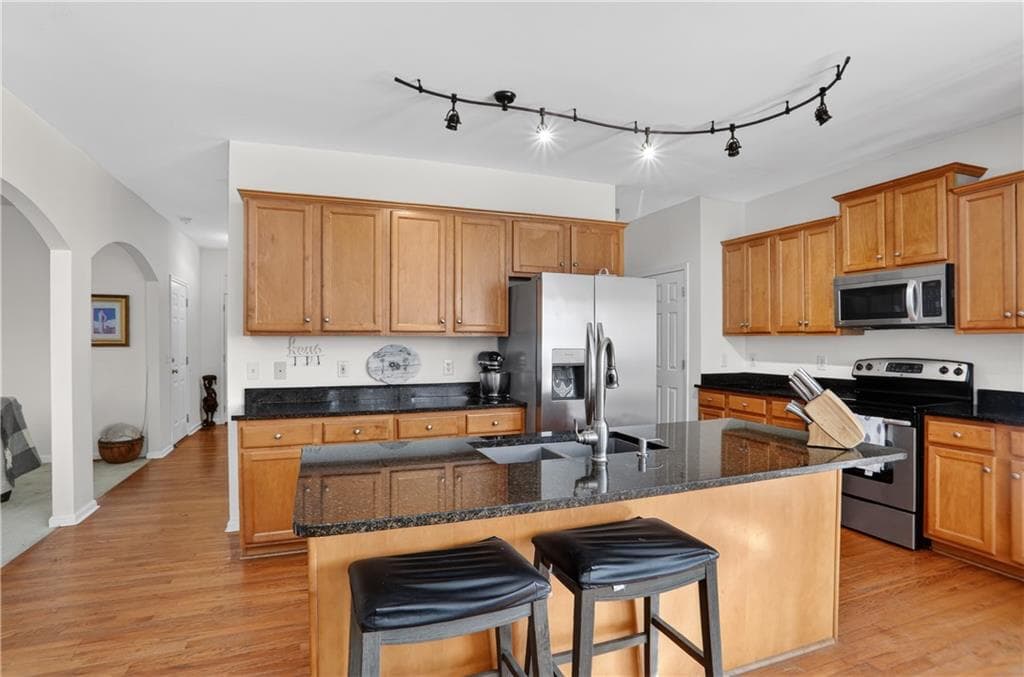 5 bedroom, 4 bathroom, 3,800 sq ft single family residence for sale at 235 Elmbrook Lane, Canton, GA 30114 — photo 7