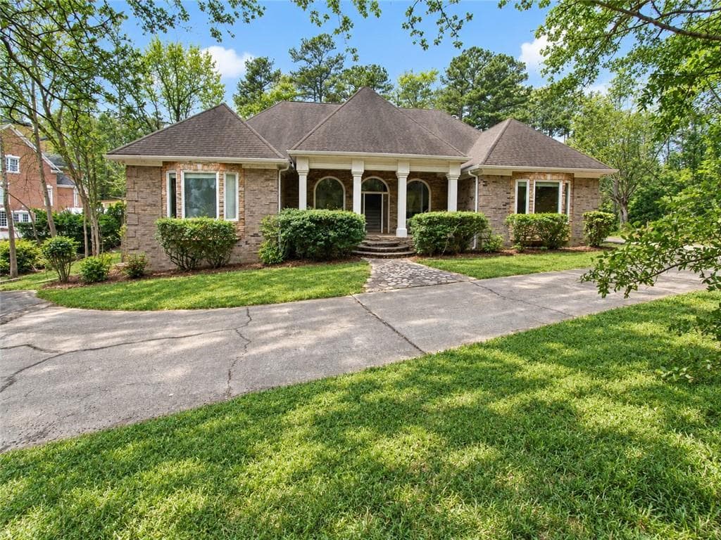 7 bedroom, 5 bathroom, 5,813 sq ft single family residence for sale at 10060 Buice Road, Alpharetta, GA 30022