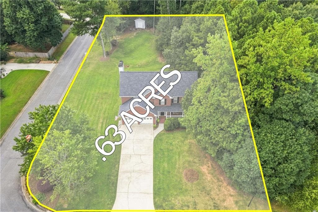 5 bedroom, 4 bathroom, 3,308 sq ft single family residence for sale at 5821 Silverthorn Drive, Flowery Branch, GA 30542 — photo 4