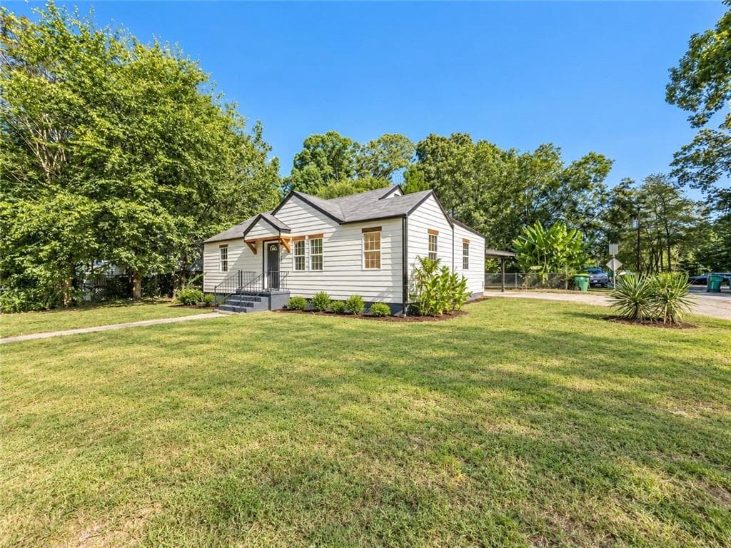 3 bedroom, 2 bathroom, 1,448 sq ft single family residence for sale at 1046 Cheaves Street, Forest Park, GA 30297 — photo 2