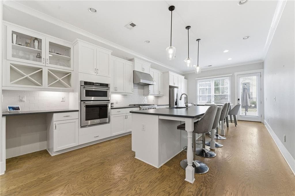 4 bedroom, 4 bathroom, 2,610 sq ft single family residence for sale at 1962 Westside Boulevard, Atlanta, GA 30318 — photo 4